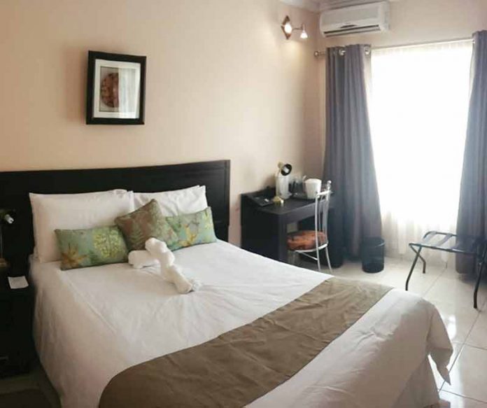 The-black-out-curtains-on-the-windows-are-just-what-you-need-after-a-late-night-out-partying-and-the-Adansonia-rooms-provide-just-that