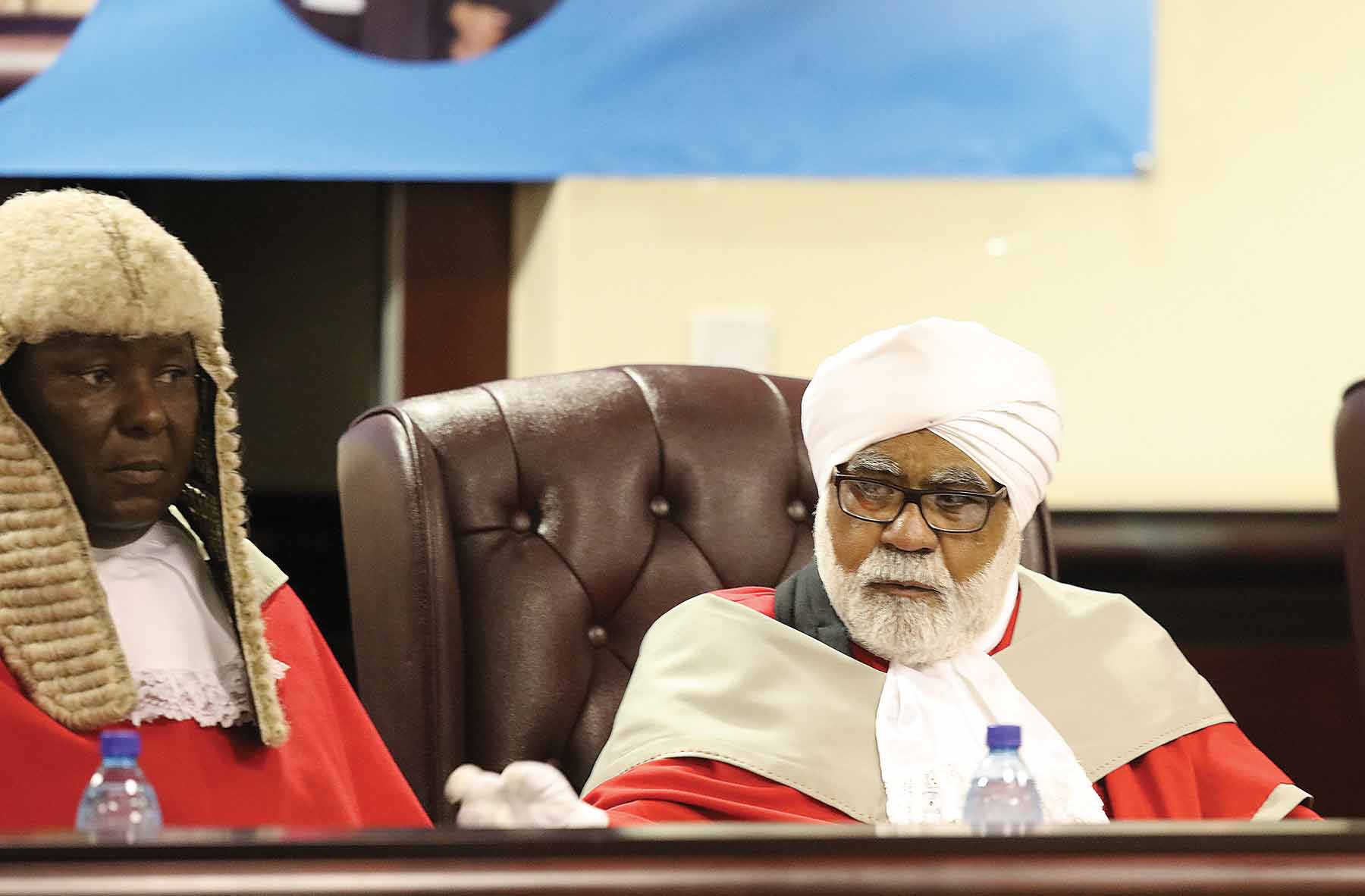 JUSTICE ABEDNICO TAFA AND SINGH WALIA