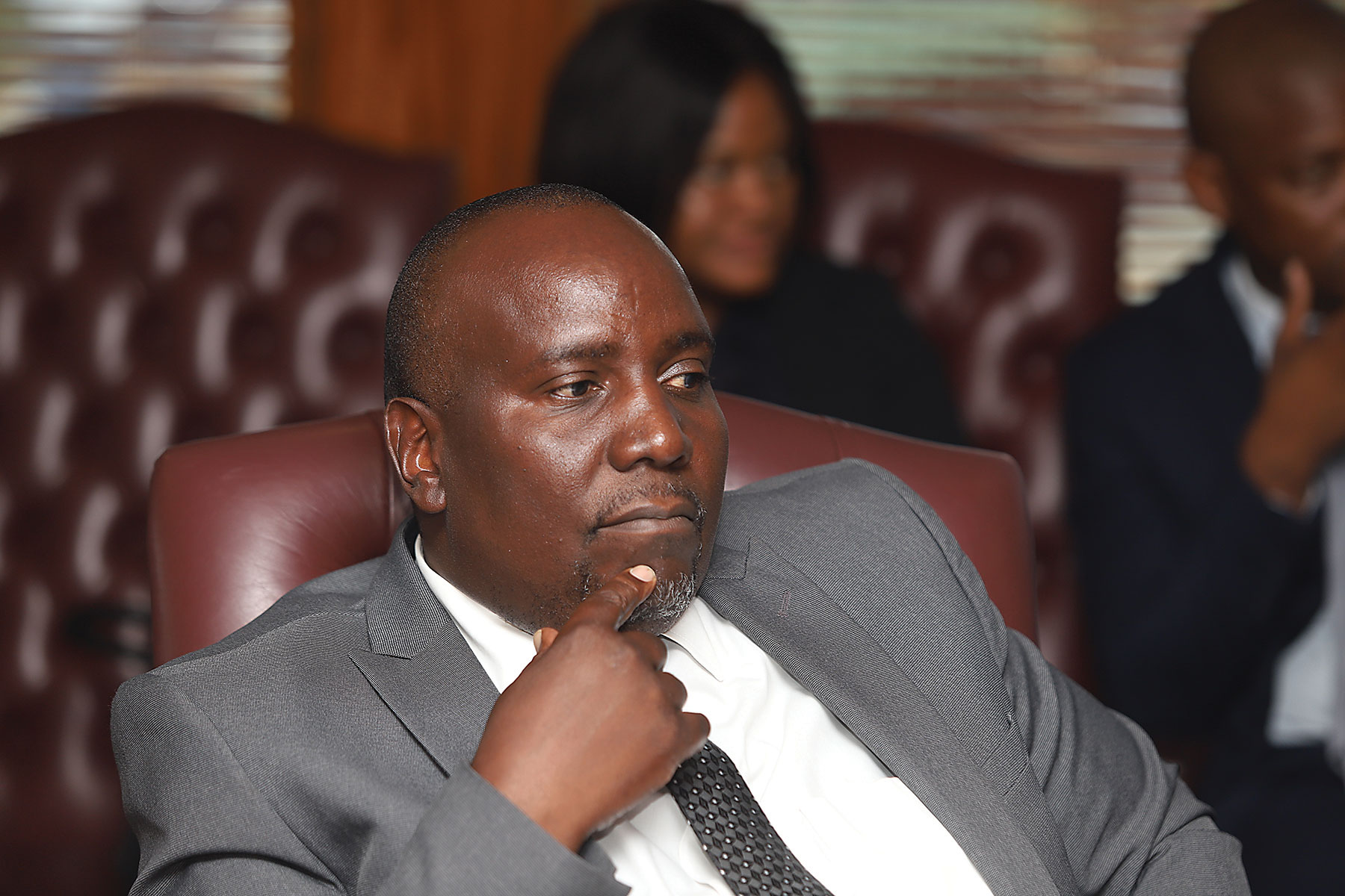 Dr DOUGLAS LETSHOLATHEBE